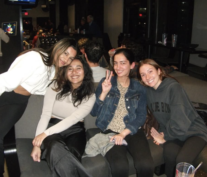 Cobalt members smiling together at a social event